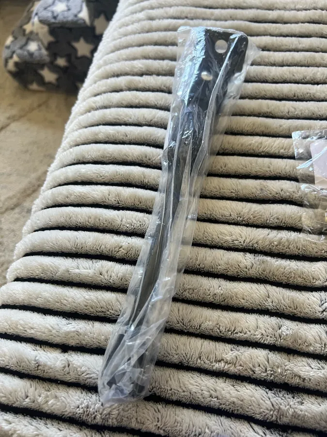 Kickstand still sealed in its shipping bag on a blanket, photographed by a verified buyer on delivery day